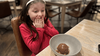 Livia in awe of the fabulous food at Vicia.  Image by Dan Sattel