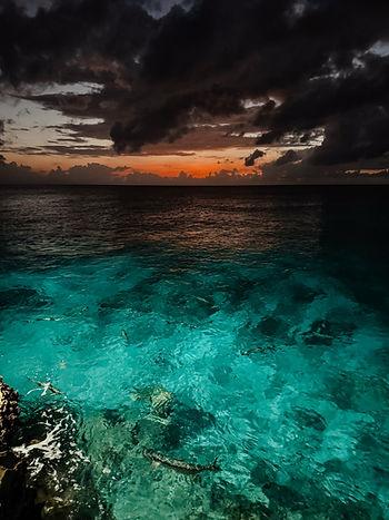 Sunset at Grand Old House, Grand Cayman.  Image by Katherine Rose Woller. 