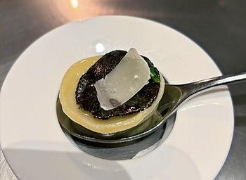 "Explosion" at Alinea.  Black Truffle, Romaine, Parmesan