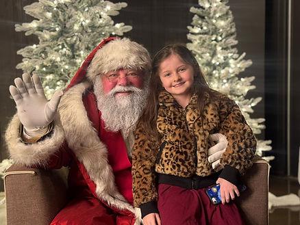Livia and Santa - opening night at Enchant Las Vegas.  Image by Christianne Klein.