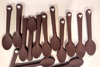 Add a chocolate spoon with decorative white hearts for a nice finishing touch. Image by Christianne Klein.