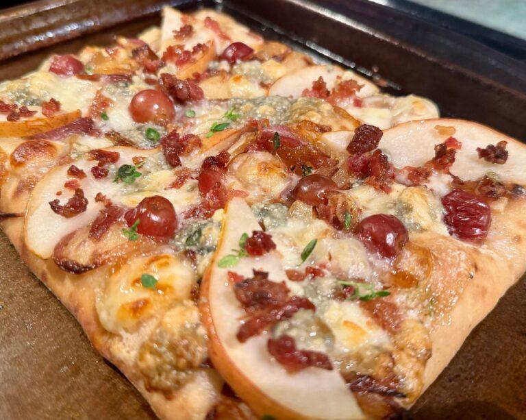 Our delicious Caramelized Onion, Bacon & Blue Cheese Flatbread fresh out of the oven. Image by Christianne Klein